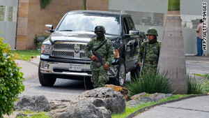 Mexican marines on December 17  guard the complex where Arturo Beltran Leyva was killed.