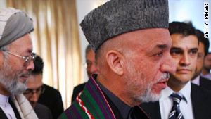 Hamid Karzai addresses a press conference at the Presidential Palace on November 3.