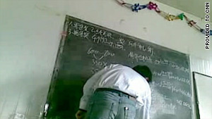 A leader of a pyramid scheme provides instruction in a video obtained by CNN.