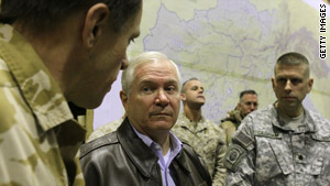 U.S. Defense Secretary Robert Gates is briefed by officials on a recent trip to Afghanistan.