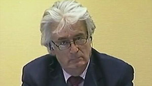 Radovan Karadzic appears at a hearing on Tuesday to discuss his refusal to appear at the trial.