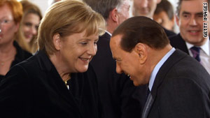 Silvio Berlusconi with German Chancellor Angela Merkel at a recent meeting in Berlin.