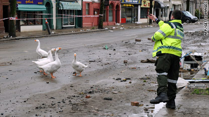 Cleanup begins in flood-ravaged UK