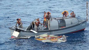 A Brazilian navy frigate crew recover wreckage from the Air France crash in June 2009.