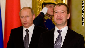 Russian Prime Minister Vladimir Putin, left, and President Dmitry Medvedev favor more offensive nuclear missiles.