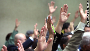 A show of hands takes place during the first session of the Kurdish parliament in Arbil on September 08.