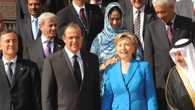 Secretary of State Hillary Clinton poses with other leaders attending the Forum for the Future in Morocco on Tuesday.