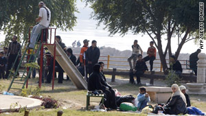 Families gather at a park near the Tigris River in Baghdad, Iraq, on Tuesday.
