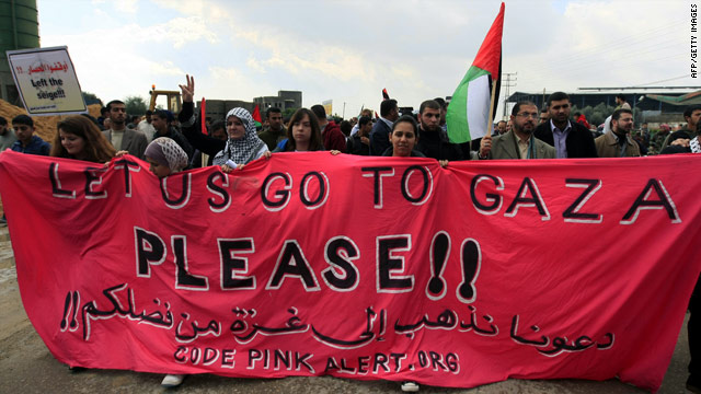 Foreign activists protest Thursday on the Gaza side of Erez border crossing between Israel and northern Gaza.