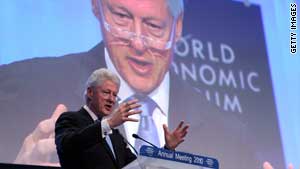Clinton calls for more Haiti aid at Davos