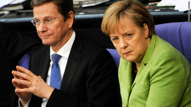 German Chancellor Angela Merkel with Finance Minister Guido Westerwelle in the German parliament on Friday.