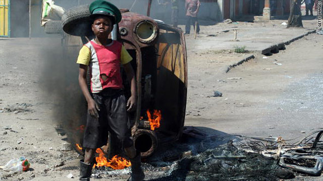 A protester on the streets of Maputo, Mozambique on September 2 following demonstrations over food and fuel prices.