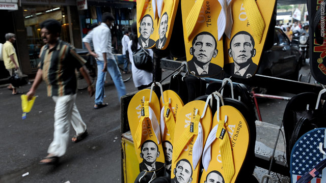 Flip-flops featuring the image of U.S. President Barrack Obama are displayed outside a shoe store in Mumbai.