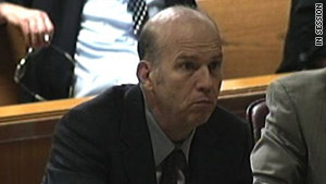 Scott Roeder listens to a witness during the first day of testimony at his murder trial.