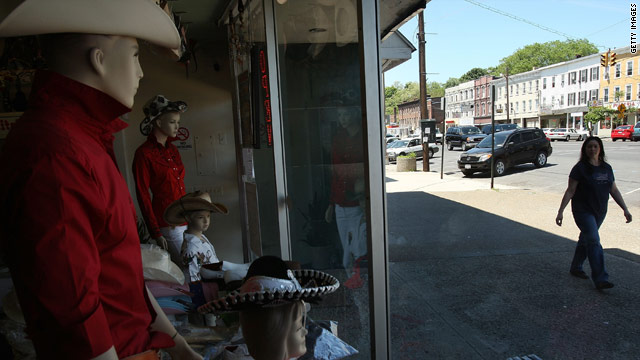 A woman strolls in Newburgh, New York. The mayor says hosting the 9/11 trial could boost the town's economy and cut crime.