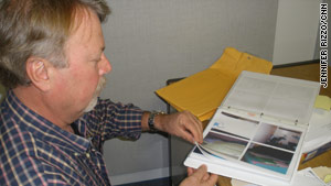 Retired Det. John Ellsworth looks at photos of the inmate's cell where the alleged scam was uncovered in 2006.