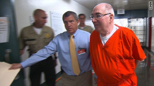 Former Beverly Hills lawyer Richard Fine is led back to his cell at L.A.'s Men's Central Jail.