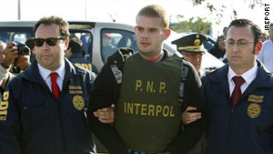 Joran van der Sloot, a suspect in Natalee Holloway's death, is in custody accused of killing a woman in Peru.