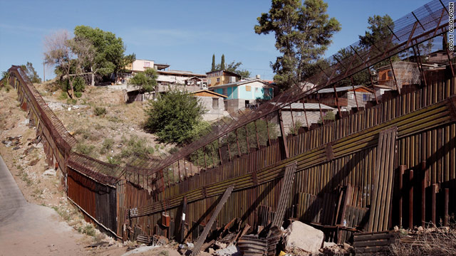 A fence separates the cities of Nogales, Arizona, (on the left) and Nogales, Sonora Mexico.