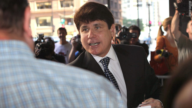 Illinois ex-Gov. Rod Blagojevich greets people as he arrives for his corruption trial last month.