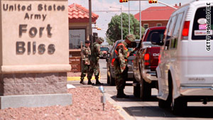 The gunman was shot and killed by law enforcement officers on the base, officials say.