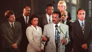 Holley, center left, worked with Johnnie Cochran on O.J. Simpson's "dream team." Simpson was acquitted.