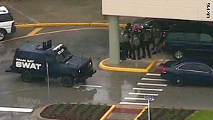 A Palm Bay SWAT team keeps the hosptial on lockdown as a gunman barricades himself inside.