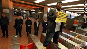 A man protests the case of California transit police officer Johannes Mehserle, convicted of killing Oscar Grant.