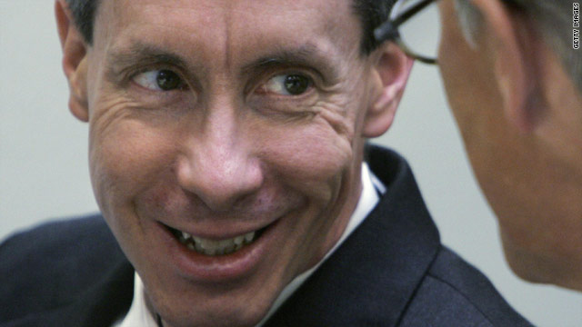 Warren Jeffs smiles as he talks with a lawyer during an earlier trial in Arizona.