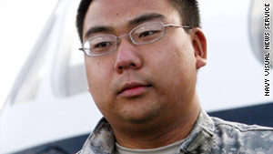 Navy Reserve Intelligence Specialist 3rd Class Bryan Minkyu Martin was taken into custody Wednesday on suspicion of selling classified information.