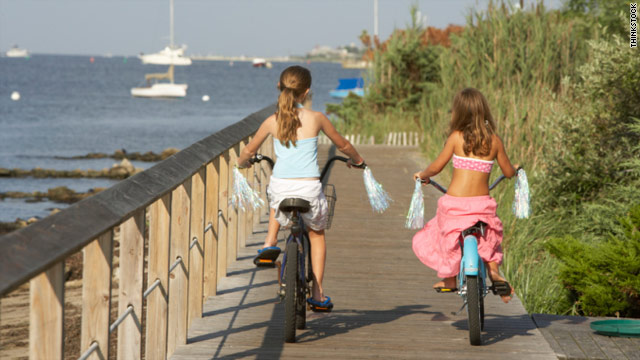 http://i.cdn.turner.com/cnn/2010/HEALTH/08/09/girls.starting.puberty.early/t1larg.girls.bikes.ts.jpg