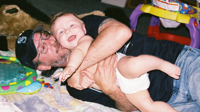 David Sklar plays with his son in this photo from 2004.  Sklar died in 2007.