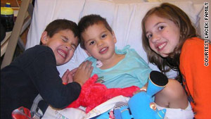 Matthew Lacek in the center, in the company of his siblings, recovered from his infection with Hib in 2006.