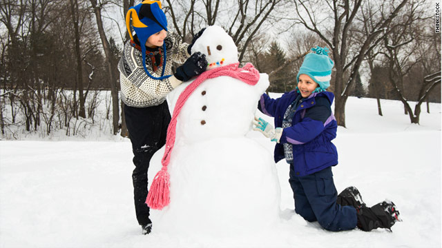 children playing outside in snow