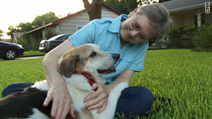 Hoffman helped give Lotto the dog a home with Joan McKinney.