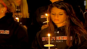 Students at Rutgers University mourn their classmate, Tyler Clementi on Sunday.