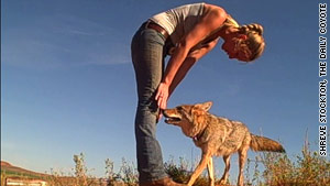 Shreve Stockton greets Charlie the coyote.