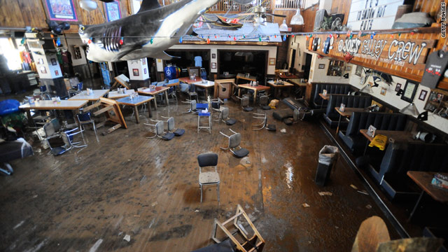 Floodwaters from weekend storms damaged restaurants such as Joe's Crab Shack in downtown Nashville.