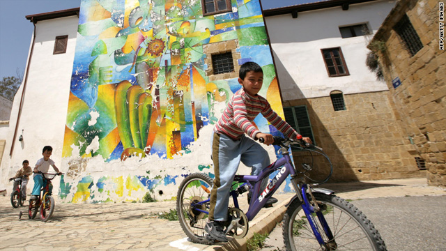 Children ride bicycles in Nicosia, Cyprus, in the Turkish-controlled northern part of the island.