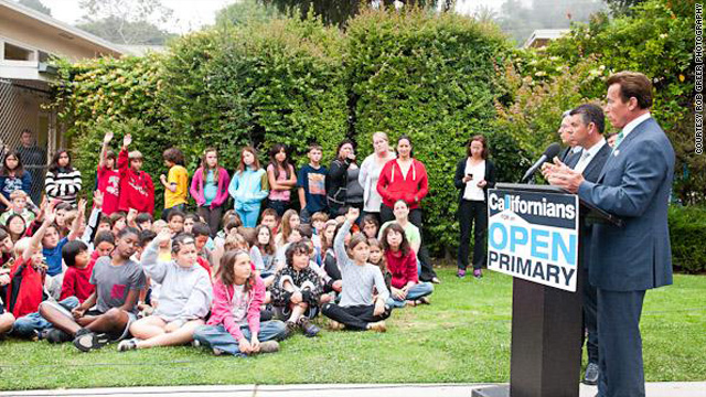 California Gov. Schwarzenegger answers questions from elementary school students at a news conference for Prop. 14.