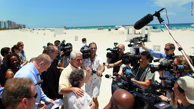 Gov. Charlie Crist speaks to the media, seeking to reassure tourists that Miami Beach is free of oil, on June 14.