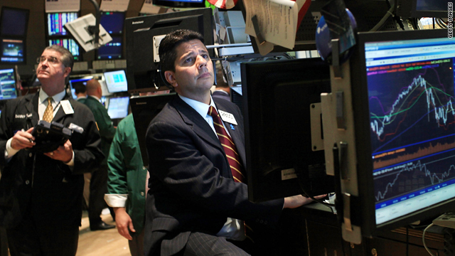 Traders work at the New York Stock Exchange this week when economic woes sent the Dow down nearly 270 points.