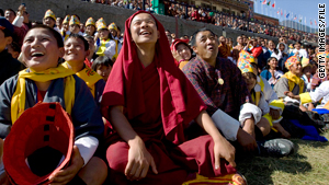 Bhutanese watching a game of pillow fighting during a coronation celebration on Nov. 8, 2008