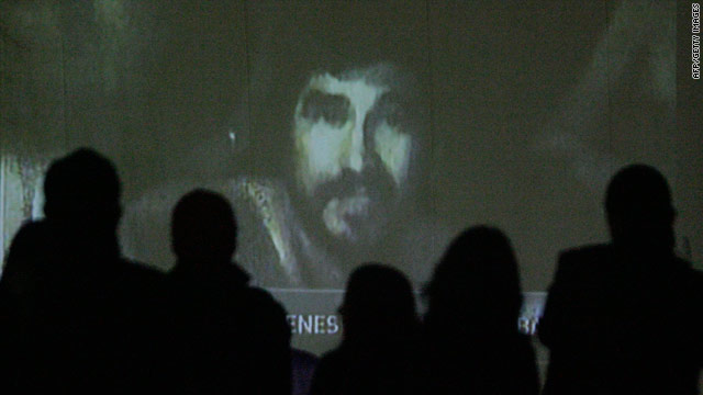 Relatives watch video of miners trapped in a gold and silver mine in Chile.