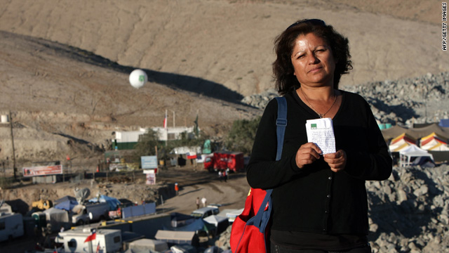 Soledad Morales, wife of "mine poet" Victor Segovia, with a letter received from him September 16.