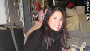 CNN White House producer Xuan Thai during the 14-hour C-17 flight to Iraq.