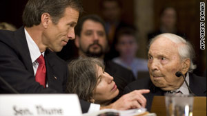 Sen. John Thune of South Dakota helps Frank Buckles, right, speak 
before a Senate subcommittee in December.