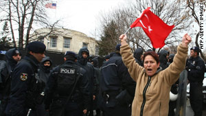 A woman protests against the proposed genocide resolution on Friday outside the U.S. Embassy in Ankara.