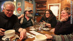 Members of the Coffee Party's Seattle chapter discuss politics at a coffee shop in Bainbridge Island, Washington.