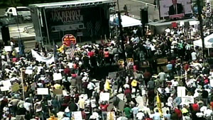 Tea Party activists hold an anti-tax rally Thursday morning at Freedom Plaza in Washington.